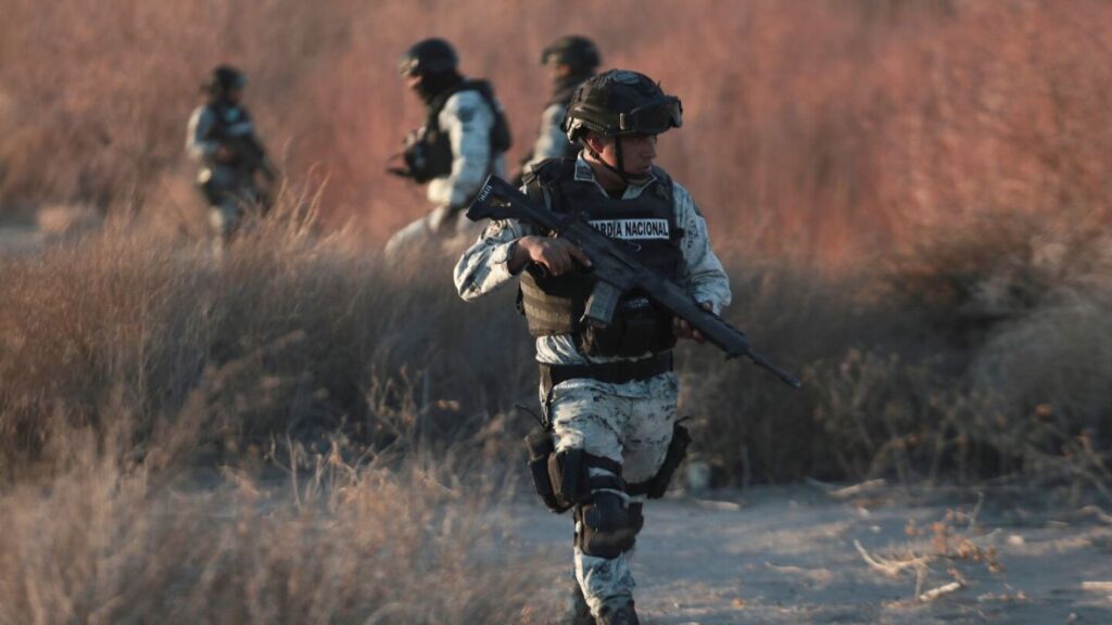 Mexico deploys the first of 10,000 National Guard troops to US border after Trump’s tariff threat | AP News