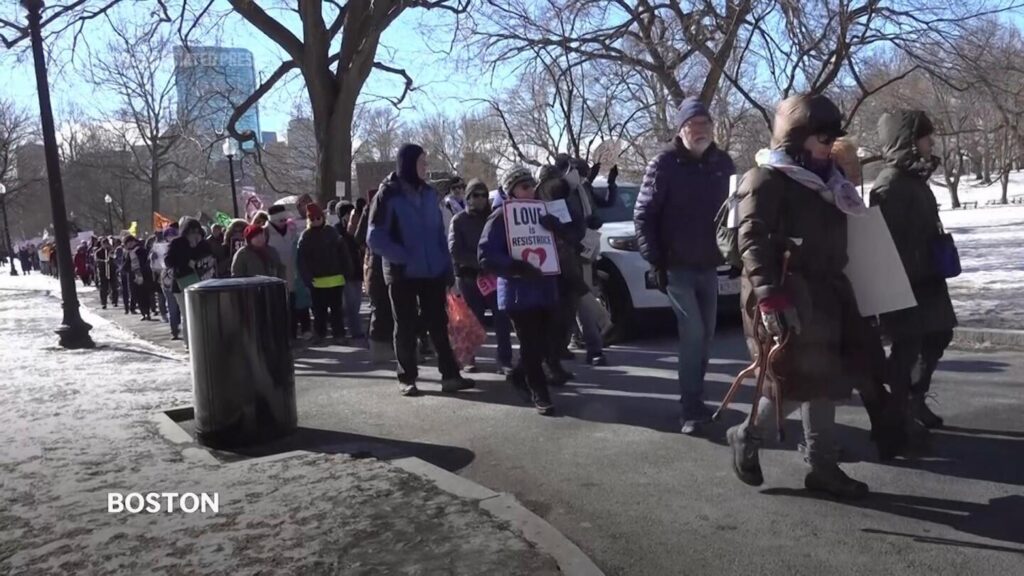 Hundreds march in Boston, chant “stop the coup” in protest against Trump, Musk polices and actions | AP News