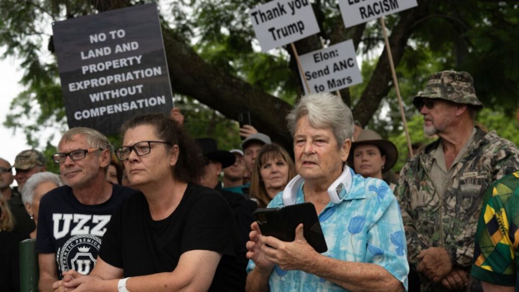 Some white South Africans gather in support of Trump and his claims that they are victims of racism | AP News
