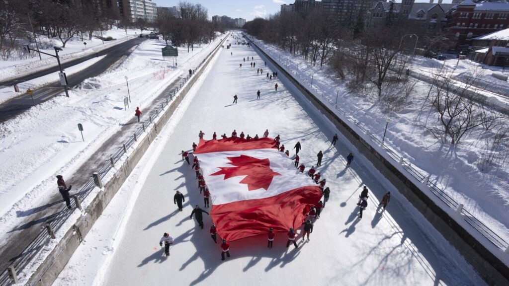 Defiant Canadians mark their flag’s anniversary as Trump hopes to make their country a state