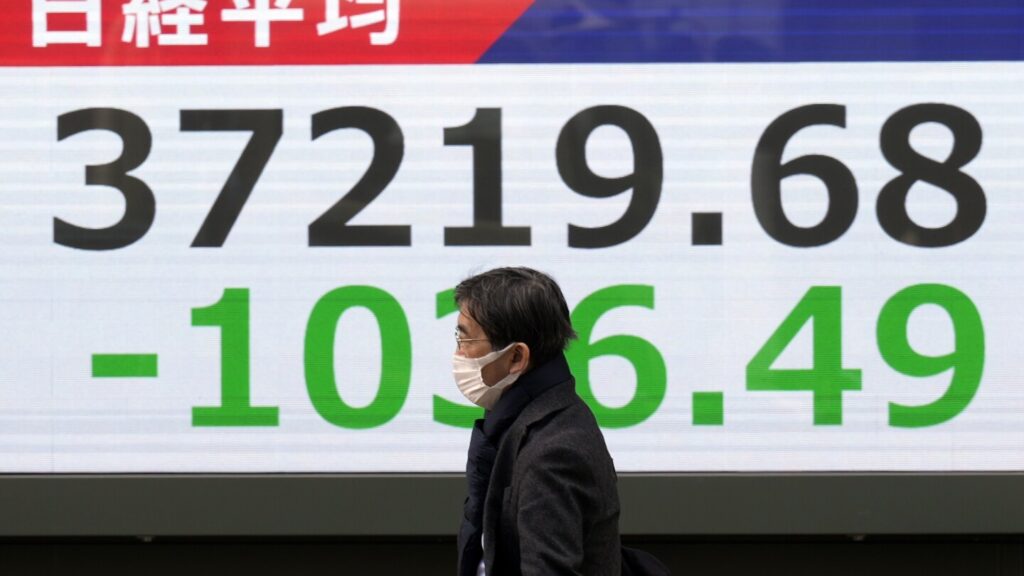 Stock market today: Asian shares skid, hit by AI doubts and Trump tariff hikes