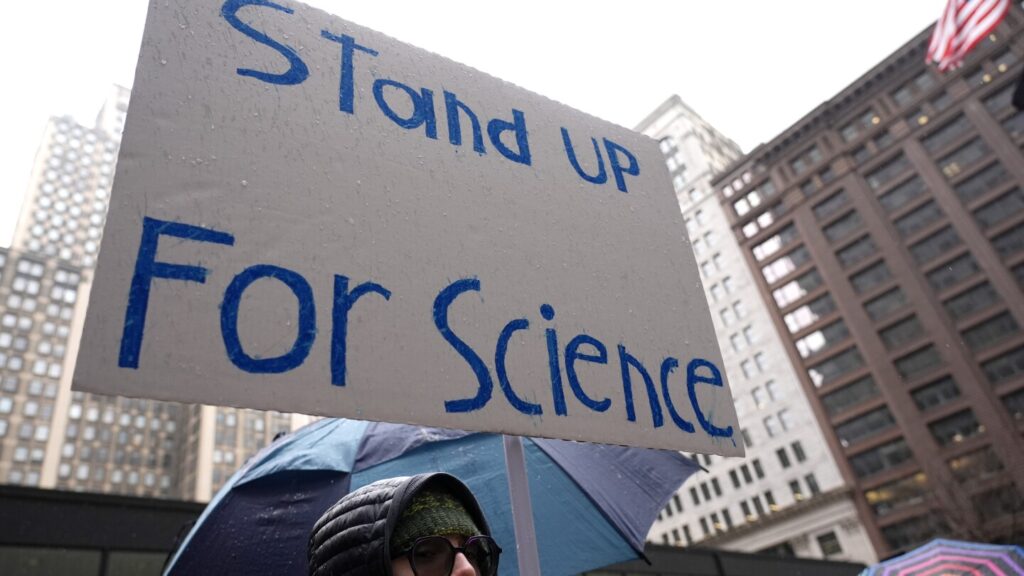 Out of the lab and into the streets, researchers and doctors rally for science against Trump cuts