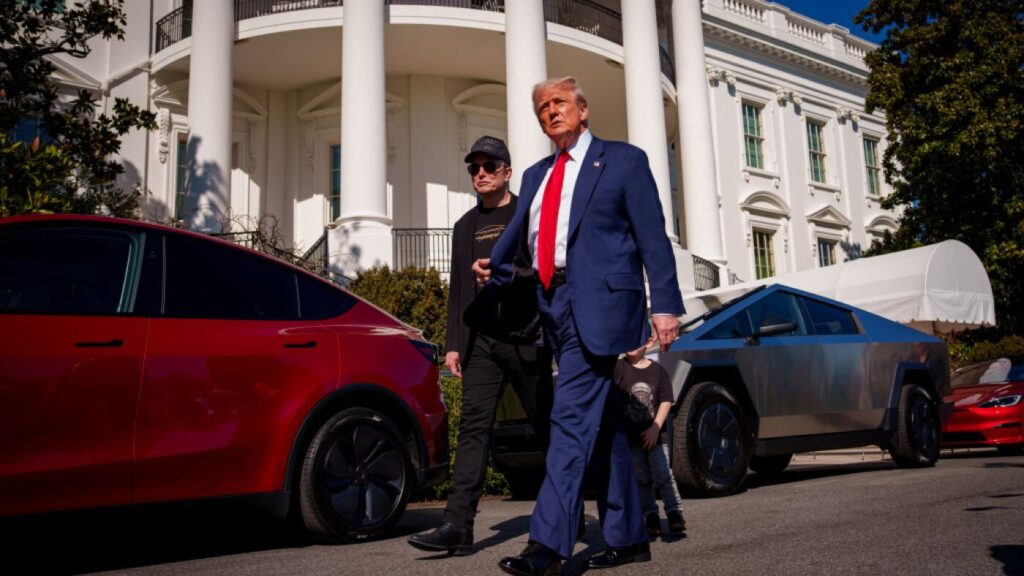 Trump buys a Tesla with Elon Musk in tow, at the White House