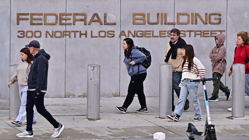 Trump administration revises directive on mass firings of federal workers