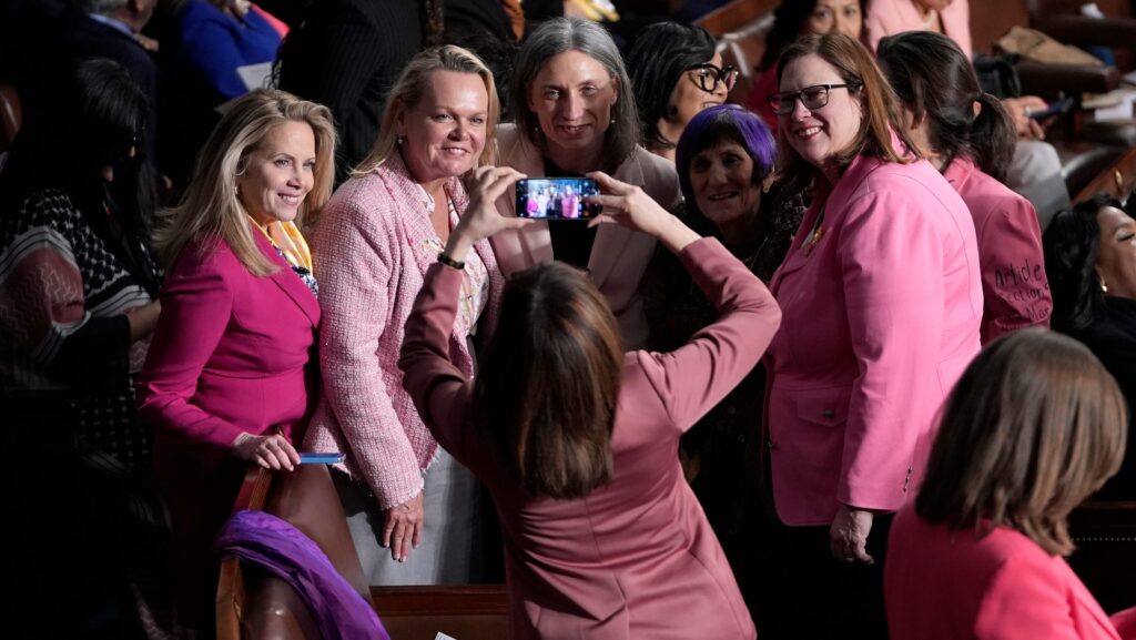 Democratic women wear pink to protest Donald Trump at address to Congress