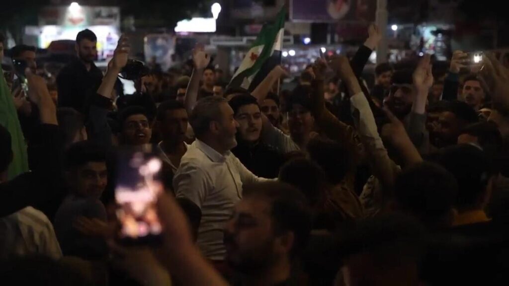Syrians celebrate as Trump says he will ease sanctions and move to restore relations with new leader | AP News