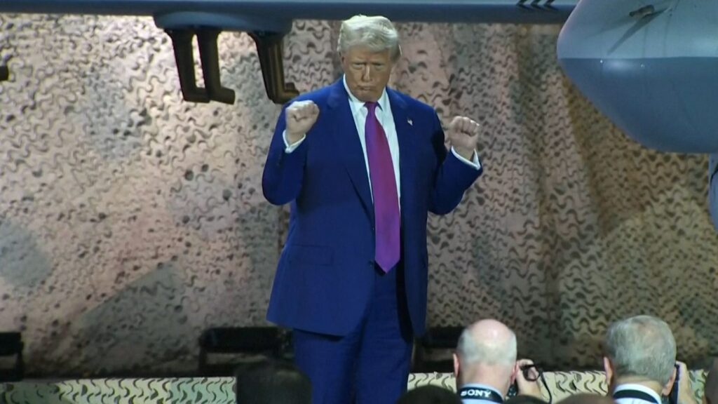 A dancing Donald Trump visits troops at US air base in Qatar during Middle East tour