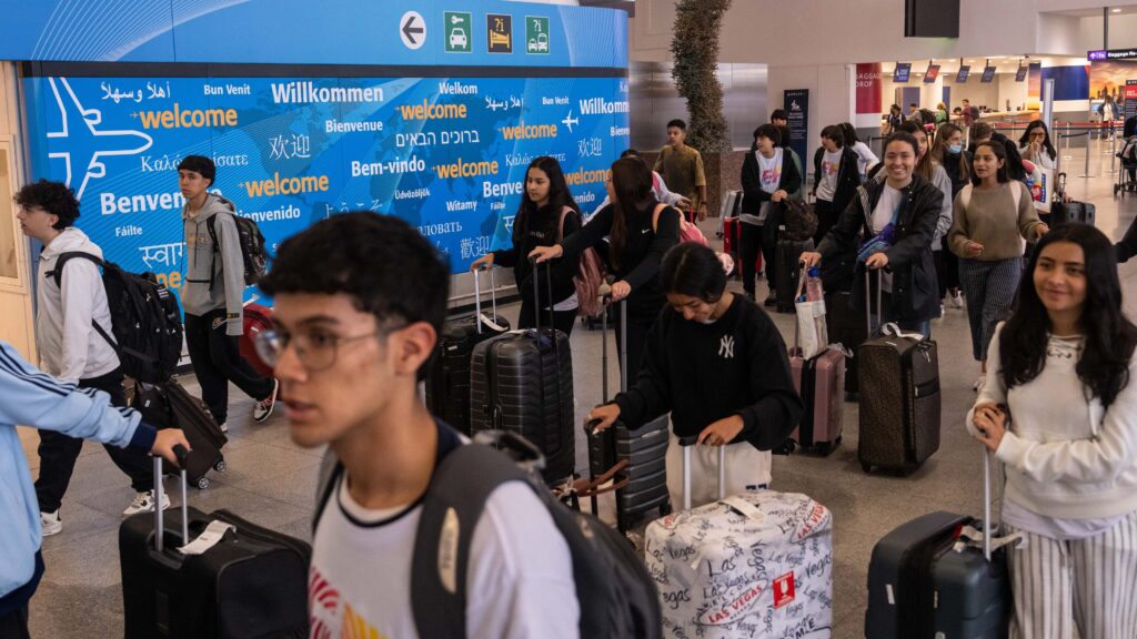 Travel bans, visa crackdowns and deportations: What to know as Trump bars the door