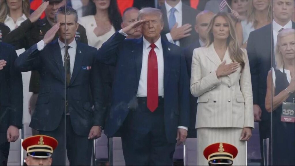 President Donald Trump arrives on stage for military parade | AP News