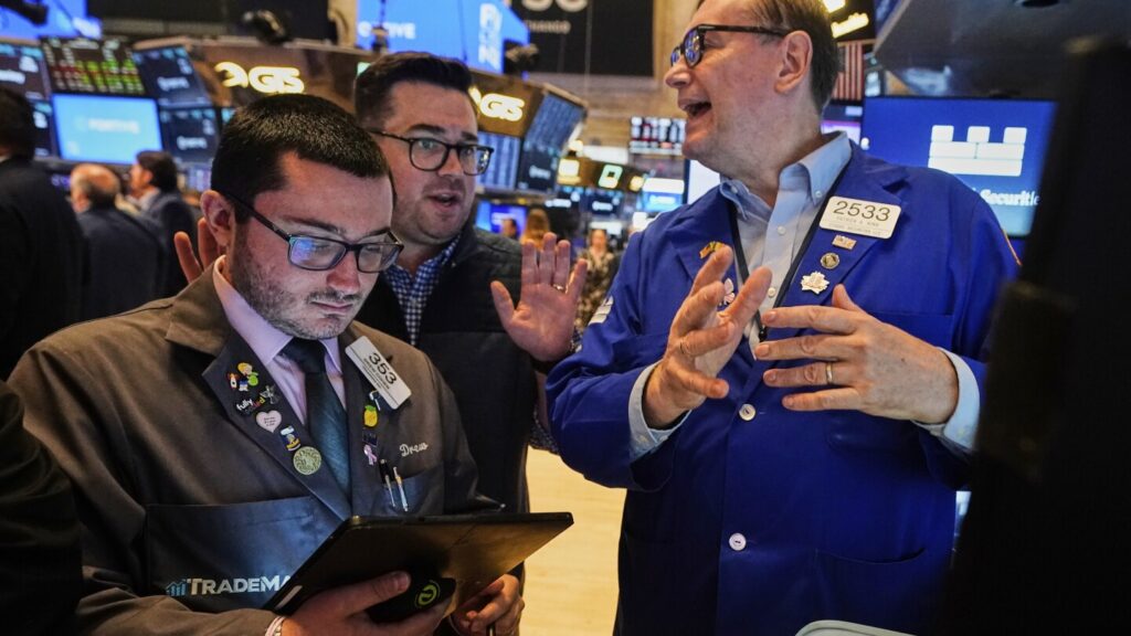 Dow drops nearly 300 after oil prices jump as Trump urges Iran’s unconditional surrender