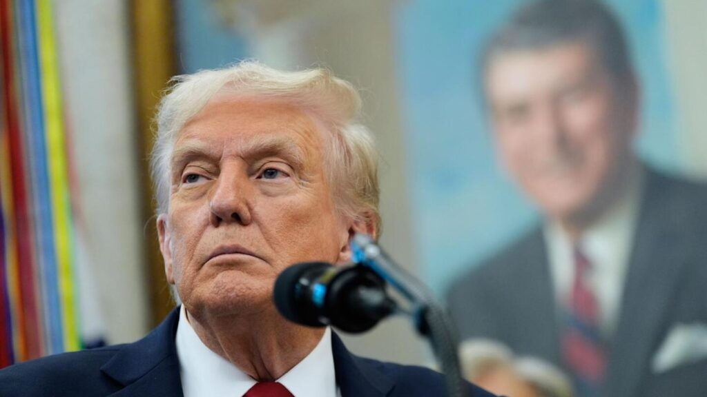 Trump uses government shutdown to dole out firings and political punishment | AP News