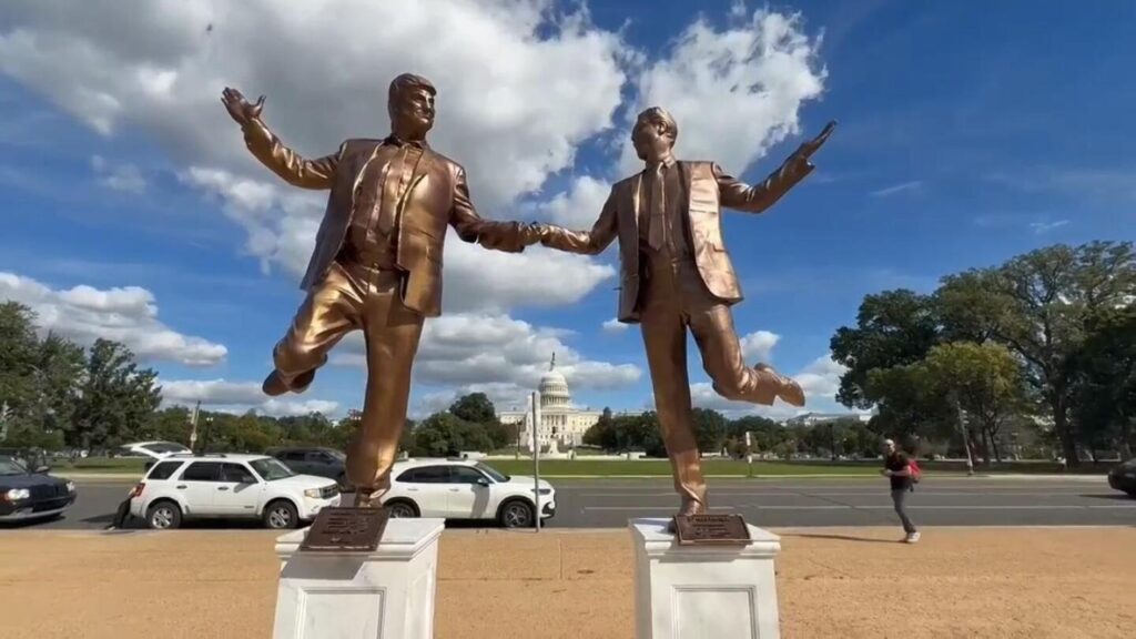 Sculpture depicting Jeffrey Epstein and Donald Trump reemerges on the National Mall | AP News